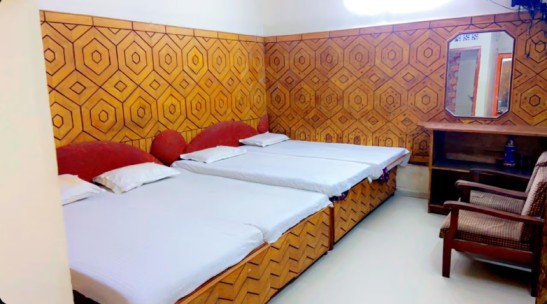 DELUXE FOUR BEDED A.C. ROOM 